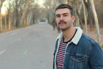 Arrogant looking hipster with copy space