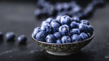 Juicy and fresh blueberries on a beautiful background