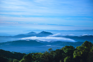 The background of nature with fog on the mountain. In the rainy weather in the countryside. winter