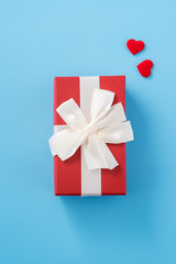 Concept of beautiful Valentine's day, anniversary, mother's day and birthday present and greetings on blue background, copyspace, topview, mockup