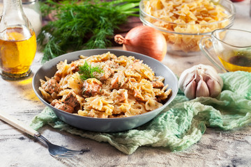 Creamy farfalle pasta with salmon, parmesan cheese and dill