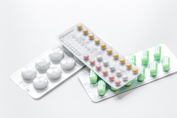 concept of female contraception on white background