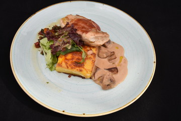 Roasted duck fillet with berry sauce and salad