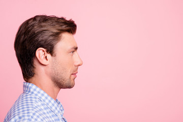 Fototapeta premium Close up side profile photo of pretty attractive he him his man relaxed watching to empty space ideal appearance wearing casual shirt outfit isolated on pale rose background