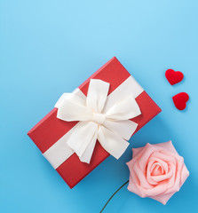 Concept of beautiful Valentine's day, anniversary, mother's day and birthday present and greetings on blue background, copyspace, topview, mockup