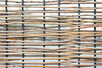 Braided wooden bars with metal rods
