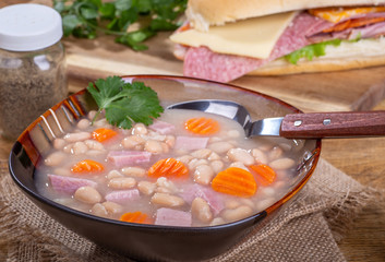 Bowl of Ham and Bean Soup With Carrots