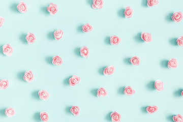 Flowers composition. Pink rose flowers on pastel blue background. Valentines day, mothers day,...
