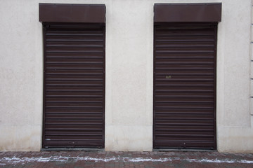 Fototapeta na wymiar Door protect with roller shutter, in Bistrita,Romania