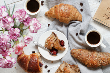 Breakfast with coffee and croissant