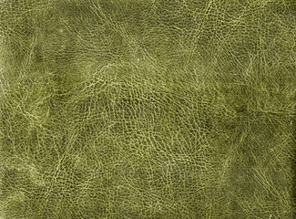 Yellow toned weathered leather texture.