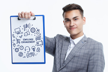 Business, technology, internet and networking concept. Young entrepreneur showing keyword: Employee...
