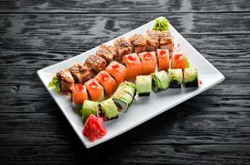 Set Sushi Roll. Chinese traditional dish. Top view. Free copy space.