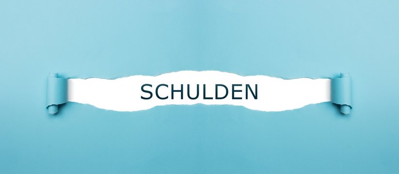Schulden auf gerissenen Papier