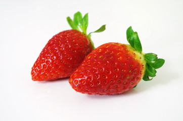 Two strawberries isolated on white background. Clipping Path