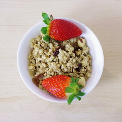 muesli with strawberry, healthy breakfast and healthy lifestyle