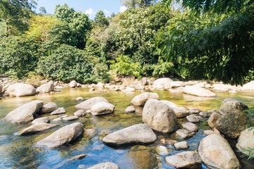 Fototapeta na wymiar River in the mountain with small waterfall, Thailand