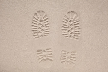 desert boot print on the sand with copy space for your text,