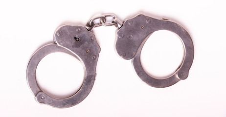 handcuffs on white background.