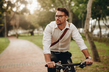Businessman going to office on bicycle