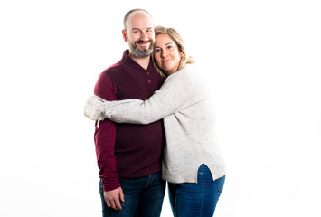 A nice Smiling couple standing on white background