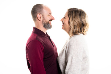 A nice Smiling couple standing on white background