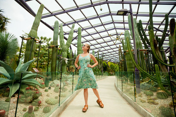 Girl walking in the cactus garden in Singapore
