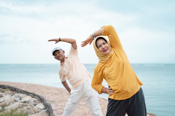 sporty woman and man workout and sport outdoor