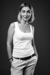 Beautiful businesswoman with short hair in black and white