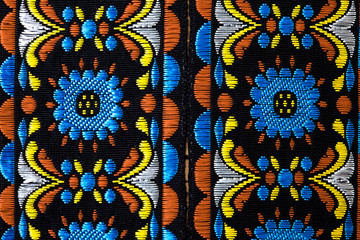 vintage varicolored ribbon with embroidered ornament