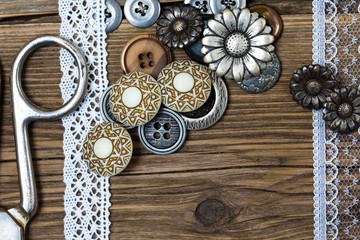 vintage buttons, lace, and a tailor scissors