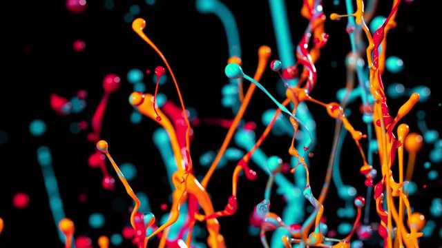 Colorful splashing paint in super slow motion. Shot with high speed cinema camera, 1000fps