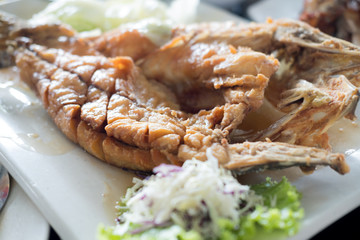 Deep fried snapper topped with sweet fish sauce