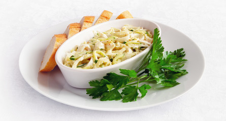 calimari vegetables salad dressed with mayo and french mustard based sauce 