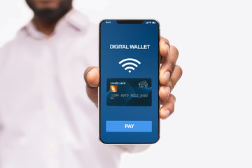 Man holding smartphone with digital wallet application