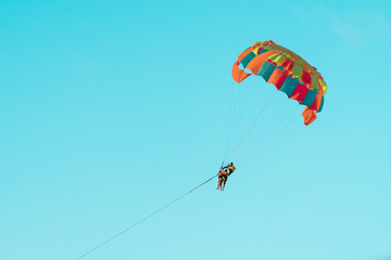 Evening parasailing on the beach of Patong, Phuket province, Kingdom of Thailand