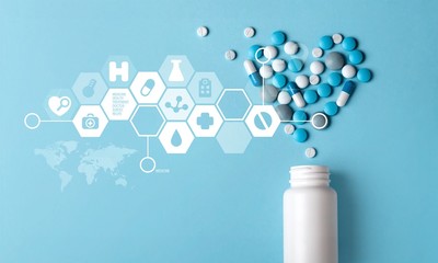 Medication pills bottle on background