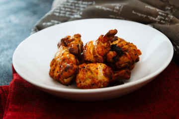roasted sleeves chicken with potatoes and barbecue sauce