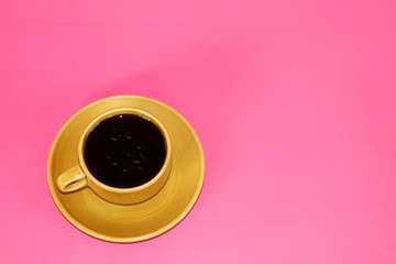 Obraz na płótnie Canvas Coffee cup on pink background.