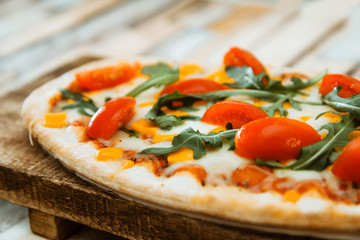 pizza with mozzarella, emmental and cheddar cheese