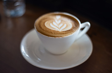 cup of coffee on black background
