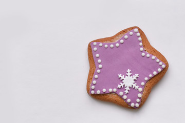 purple star with snowflake Christmas cookies, isolated on white