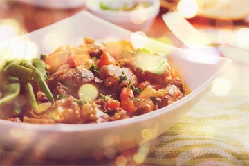 Tasty meat in white plate on light background