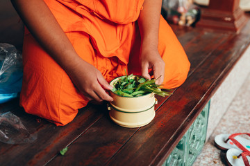 Thai Monk preparing for lunch