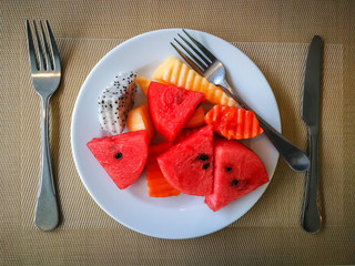 Thai dessert, Many fruits that are slice on the plate.