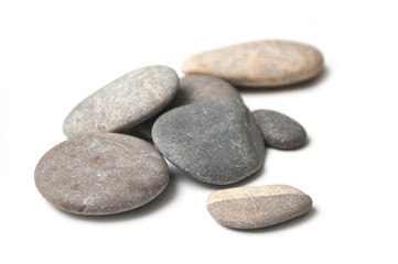 group of pebbles on white background