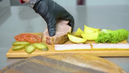 the process of cooking a burger with salad and piccul