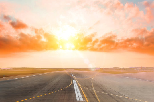 Airport Empty Runway In The Evening Sunset Light, Clear For Airplane Landing Or Taking Off