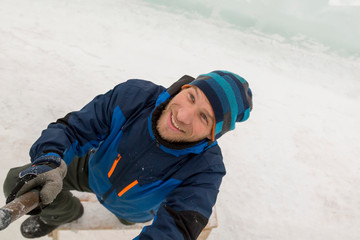 Portrait of a sculptor with a chisel in his hands