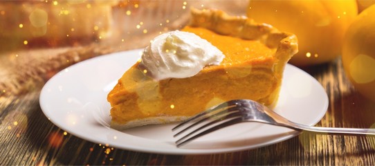Tasty pumpkin pie on background